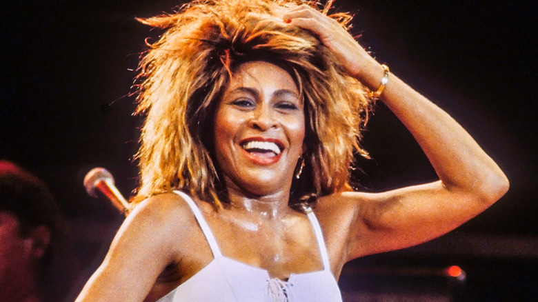 Tina Turner on stage smiling
