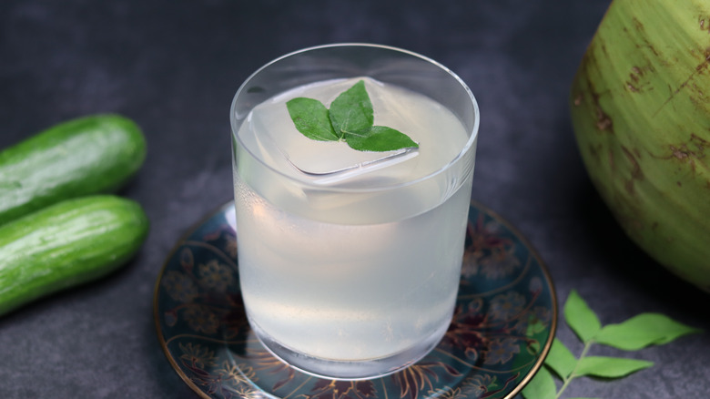 Coconut water with cucumbers and herbs