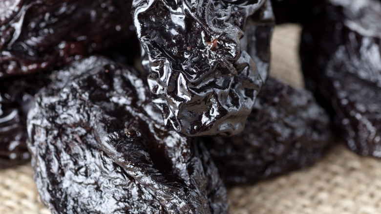 Dried prunes in pile