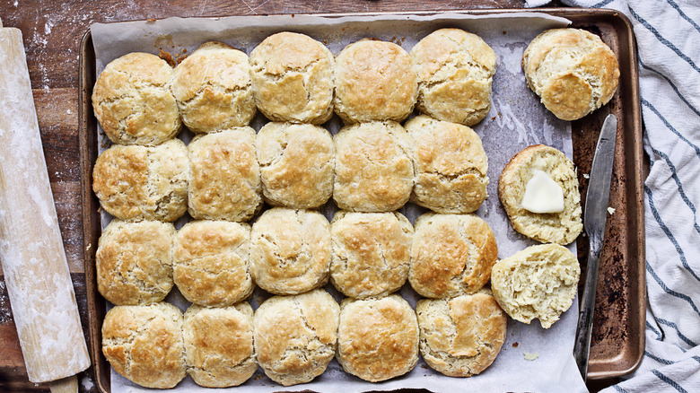 Homemade buttermilk biscuits on a baking tray