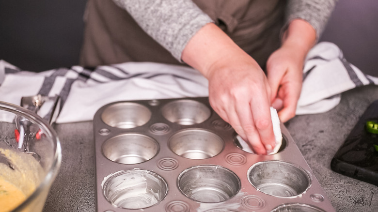 Greasing a muffin pan