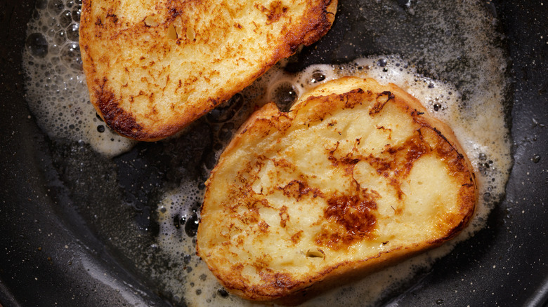 Bread frying in pan