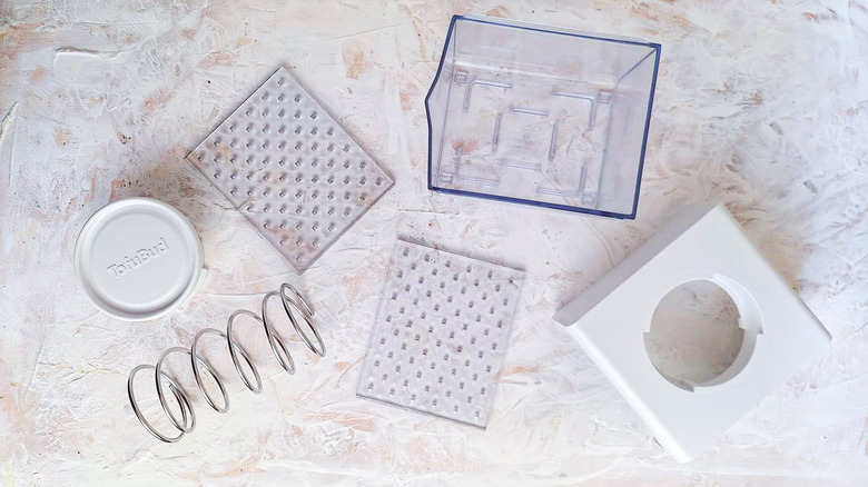 Parts of a tofu press
