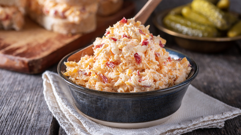 Close up of a bowl of pimento cheese spread