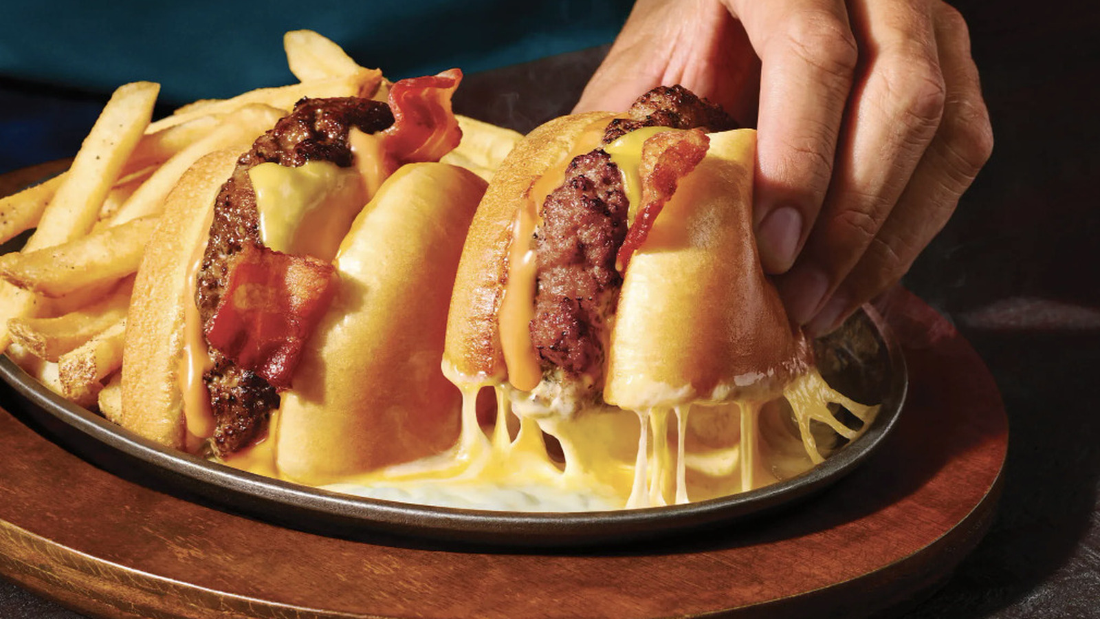 Too Cheesy To Ignore: The Popular Japanese Burger Behind Applebee's Sizzling New Addition - Tasting Table