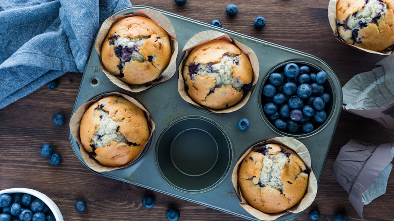 Blueberry muffins in tin