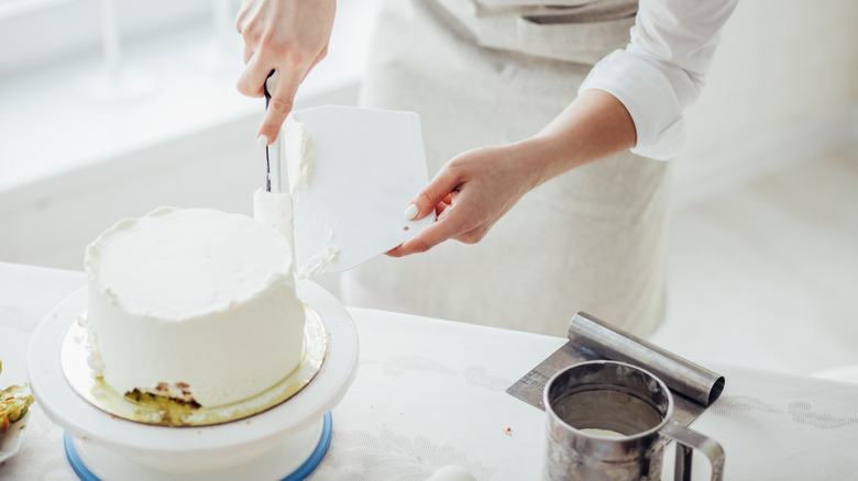 Person using offset spatula