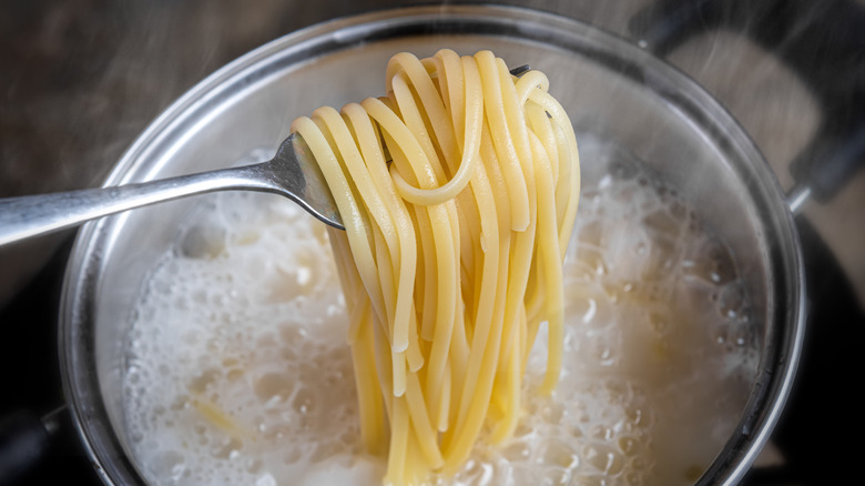 boiling spaghetti in pot