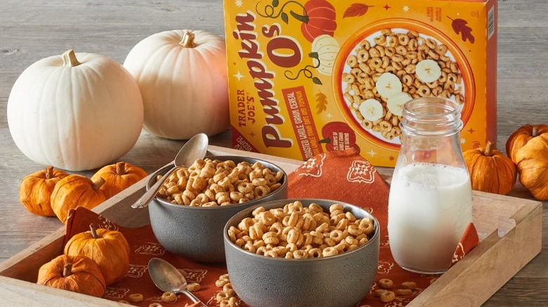 Trader Joe's Pumpkin O's cereal in bowls with the box behind