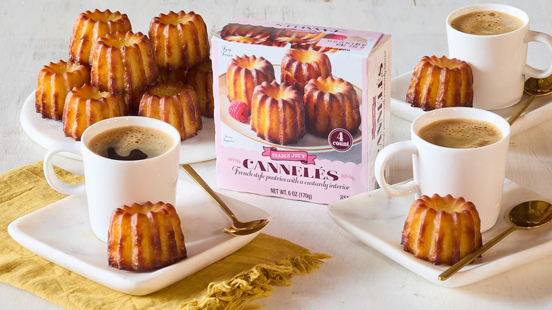 Box of Trader Joe's Cannelés and on plates with coffee.