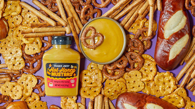 Jar of Trader Joe's Hot Honey Mustard with pretzels.