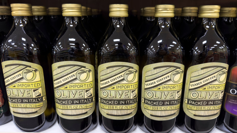 Bottles of olive oil on shelf at Trader Joe's