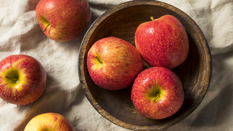 Overhead shot of Envy apples in bowl.