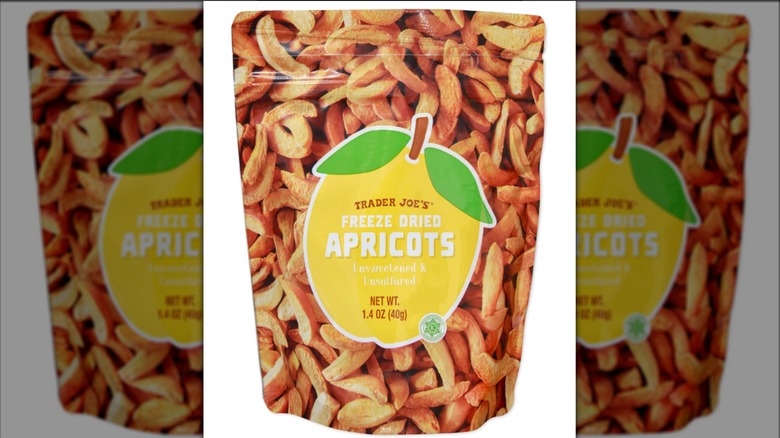 Resealable bag of Trader Joe's freeze dried apricots on white background
