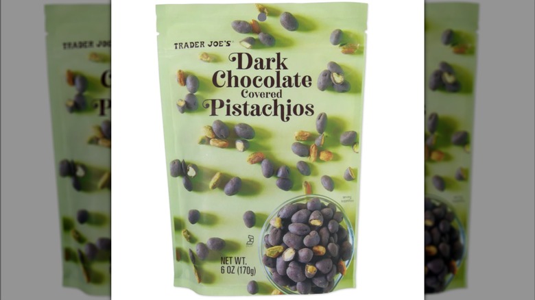 Image of dark chocolate covered pistachios with white background
