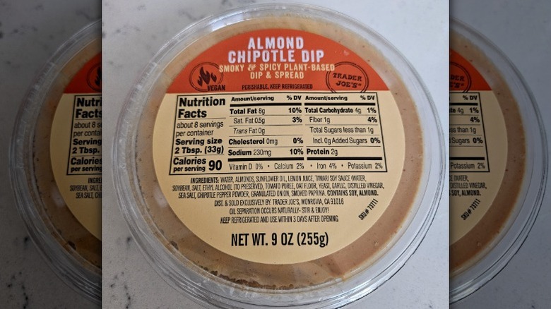 A container of Trader Joe's Almond Chipotle Dip