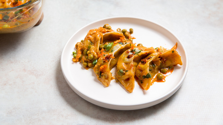 colorful dumplings on white plate