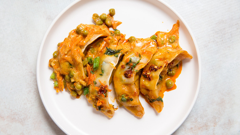 colorful dumplings on white plate