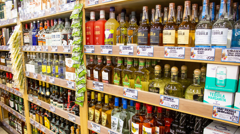Bottles of liquor on shelves at a Trader Joe's store