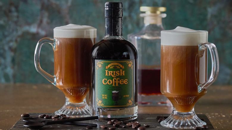 Trader Joe's Irish Coffee cocktail beside two mugs