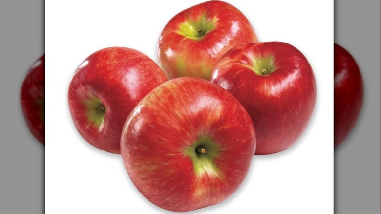 Honeycrisp apples on white background