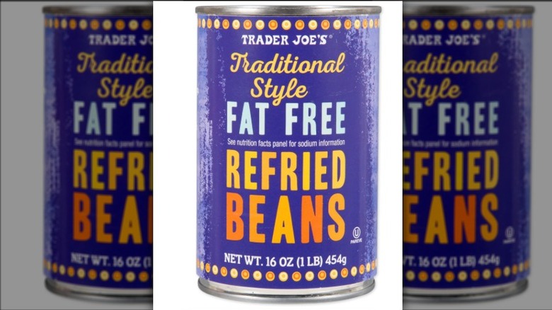 Can of refried beans on white background