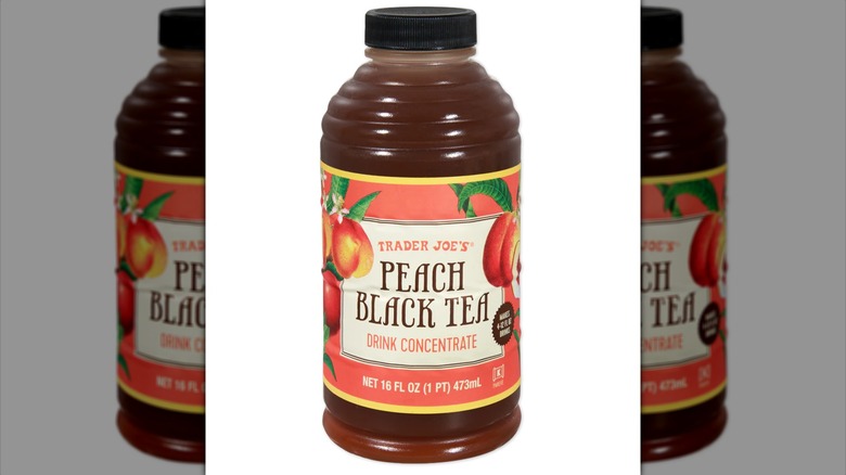 Bottle of Trader Joe's Peach Black Tea Drink Concentrate on white background