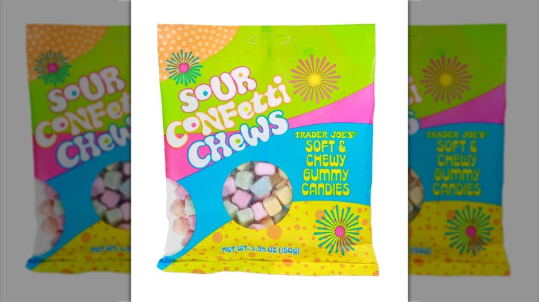 Colorful bag of Trader Joe's Sour Confetti Chews candy on white background