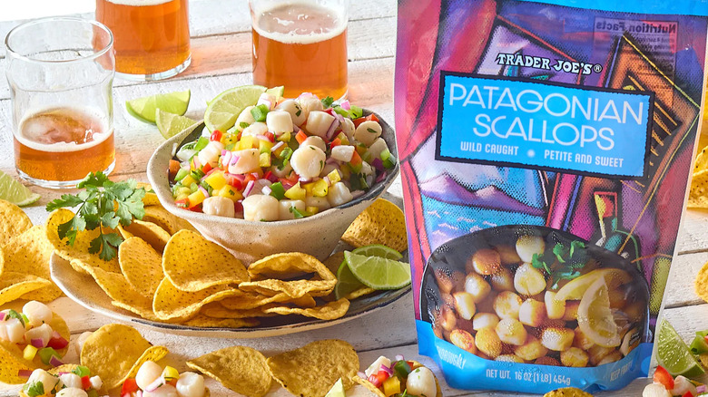 Trader Joe's frozen Patagonian Scallops with glasses of beers and a plate of nachos with salsa