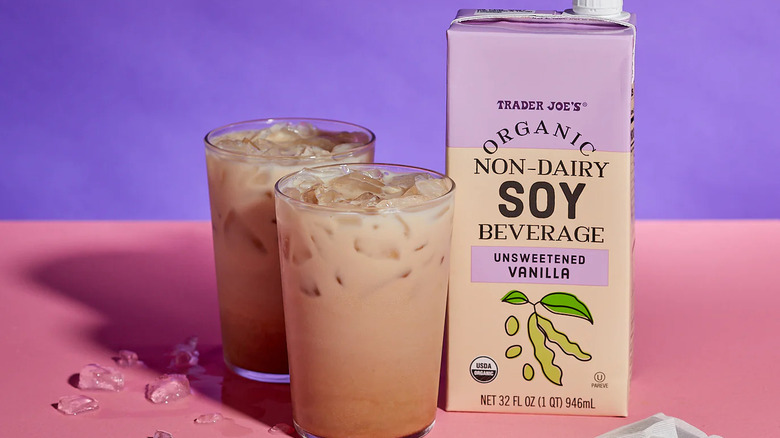 Trader Joe's Organic Non-Dairy Unsweetened Vanilla Soy Beverage next to two prepared glasses