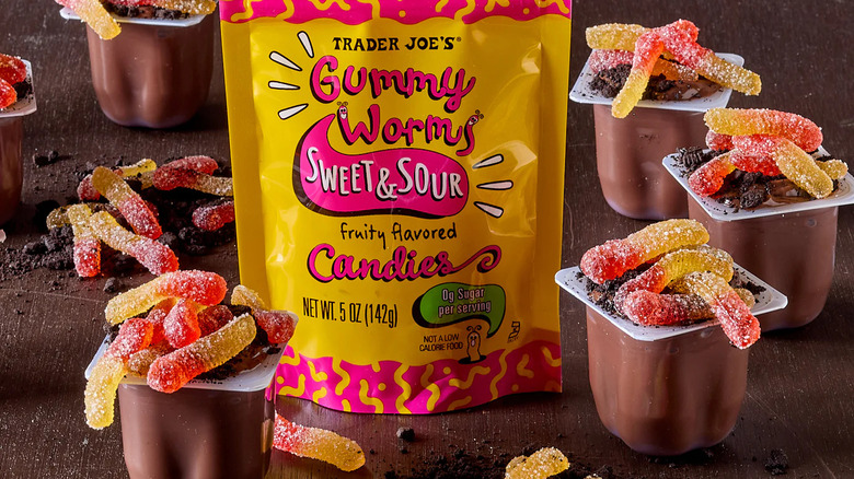 Trader Joe's Sweet & Sour Gummy Worms Candies on top of chocolate pudding cups