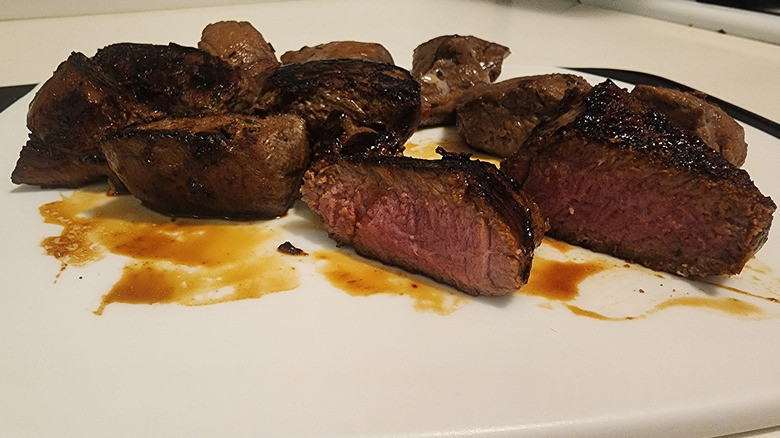 Steak tips on cutting board