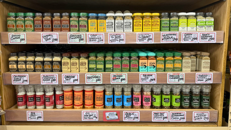 Jars of spices sit on Trader Joe's shelf