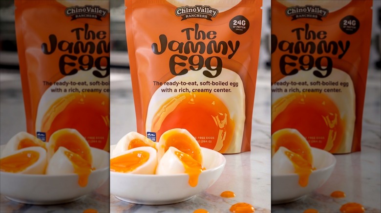 A package of Chino Valley Ranchers' The Jammy Egg next to a white bowl of soft-boiled eggs cut in half