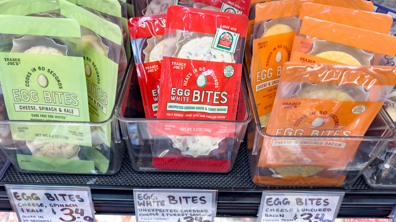 Several packs of  Egg Bites on store shelf at Trader Joe's