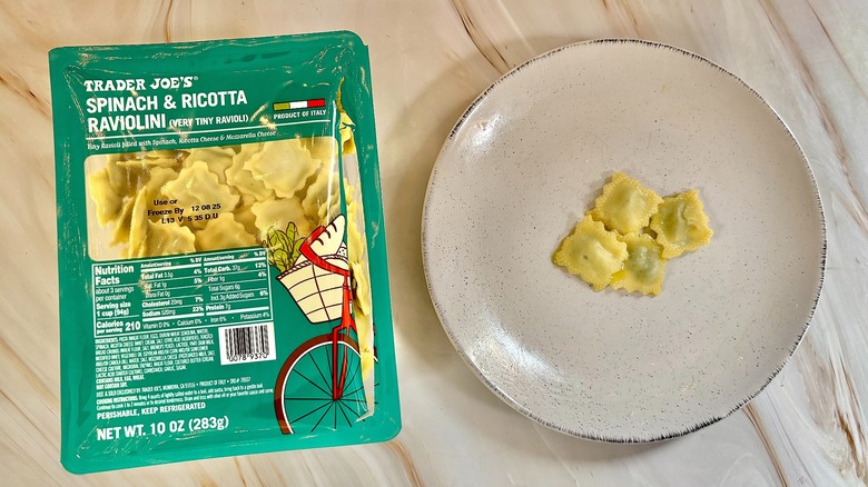 Trader Joe's Spinach & Ricotta Ravioli on white plate next to package