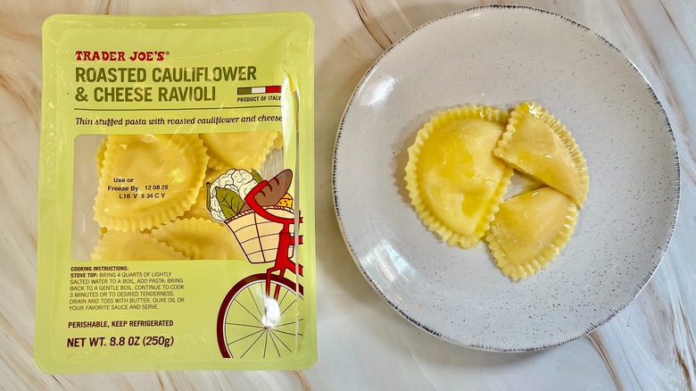 Trader Joe's Roasted Cauliflower & Cheese Ravioli on white plate next to package