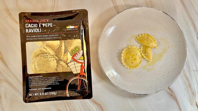 Trader Joe's Cacio e Pepe Ravioli on white plate next to package