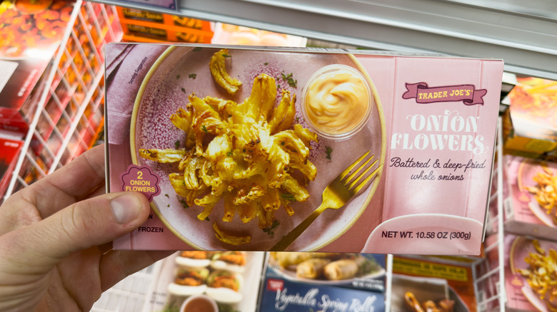 person shopping in frozen food section at Trader Joe's