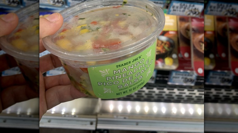 Box of salsa with mango and pineapple and tomato