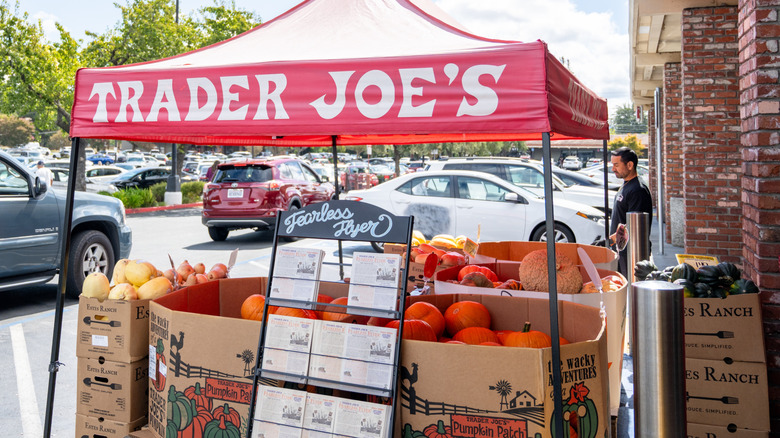 Pumpkins for sale outside of a Trader Joe's store