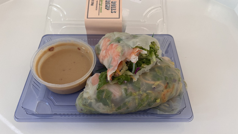 Trader Joe's spring rolls with shrimp on platter with a dip on the side