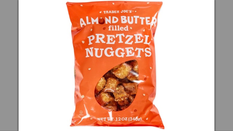 Bag of Trader Joe's almond butter filled pretzel nuggets on white background
