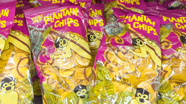 Purple bags of plantain chips on shelf at Trader Joe's