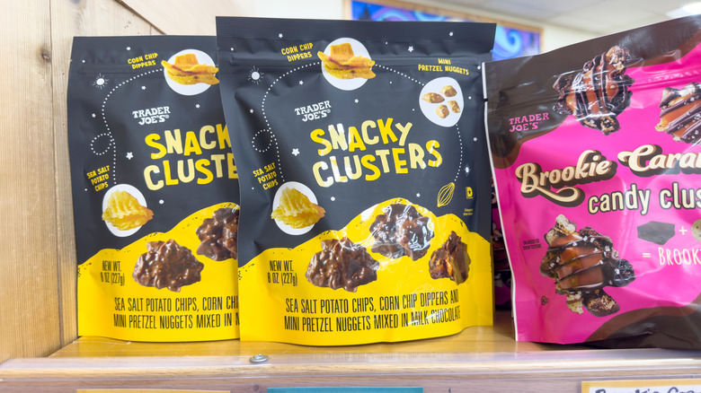 Bags of Trader Joe's snacky clusters on shelf in store