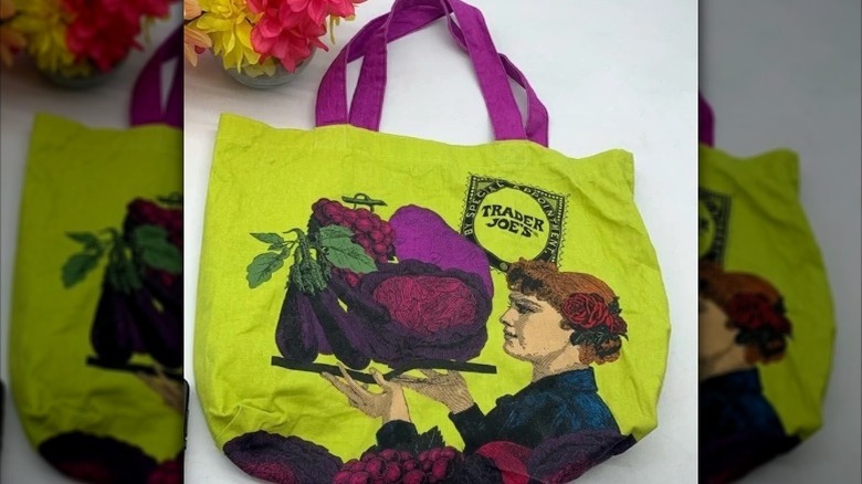 Green Trader Joe's tote bag featuring illustrations of Victorian women with purple produce
