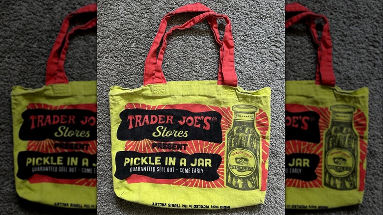 Pickle themed green Trader Joe's tote bag with red handle and jar of pickles illustration