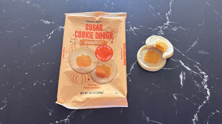Trader Joe's sugar cookie dough pumpkins package next to cookies on countertop