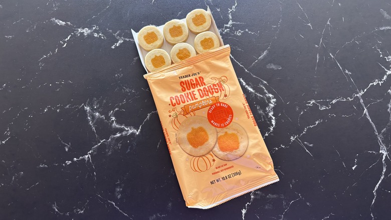 Trader Joe's Sugar Cookie Dough Pumpkins packaging with cookie sheet pulled out