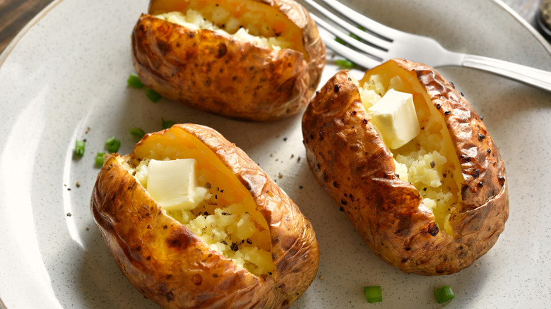 Baked potatoes on plate